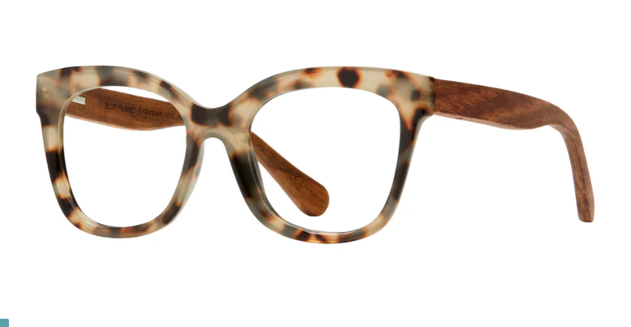 A pair of Nora brand eyeglasses with a cat eye design, featuring a patterned frame and blue light filtering lenses.
